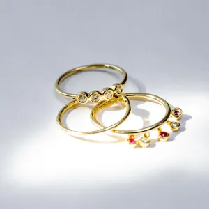 Four diamond bezel gold stackable
